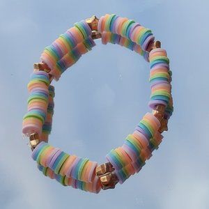 Clay bead stretchy string bracelet When you buy 2 you get 1 free bracelet!